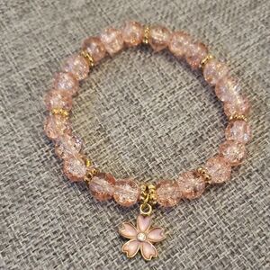 Chic Pink Beaded Stretch Bracelet with Floral Charm
